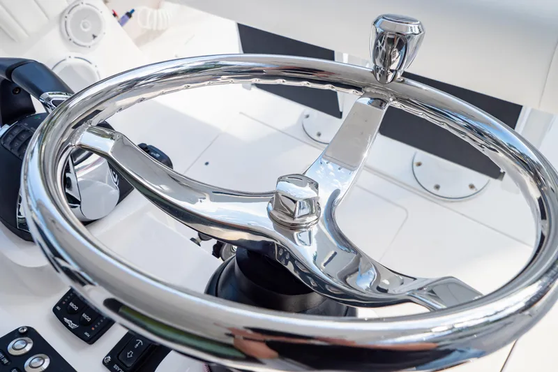  Yacht Photos Pics Steering wheel of 2019 Intrepid 407 Cuddy boat, shiny chrome finish.
