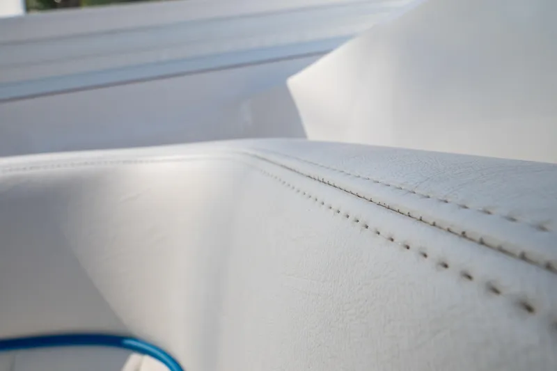  Yacht Photos Pics Close-up of white leather upholstery on a 2019 Intrepid 407 Cuddy boat.