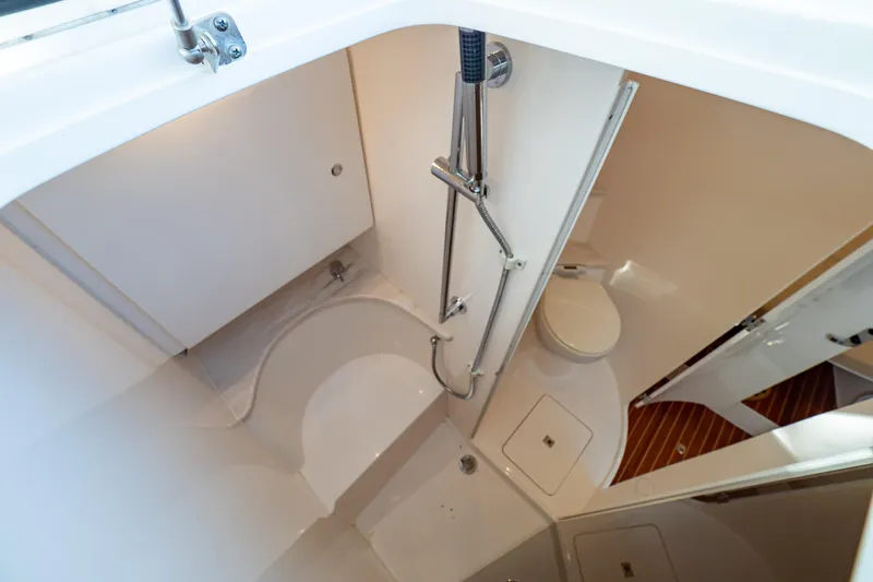  Yacht Photos Pics 2019 Intrepid 407 Cuddy bathroom with shower and toilet.