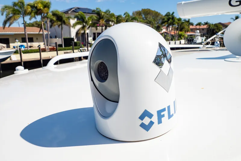  Yacht Photos Pics FLIR camera on 2019 Intrepid 407 Cuddy boat deck, with waterfront background.