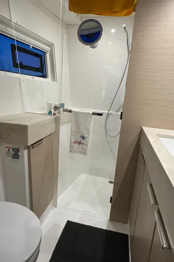 Encore Yacht Photos Pics Modern bathroom in 2021 Lagoon 40 yacht with shower and sleek design.
