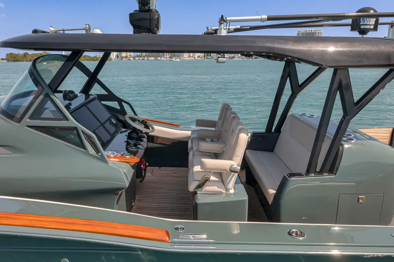  Yacht Photos Pics 2025 Buddy Davis PININFARINA 47 CC luxury yacht interior with modern seating and navigation controls.