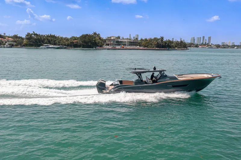  Yacht Photos Pics 2025 Buddy Davis PININFARINA 47 CC cruising on a sunny day.