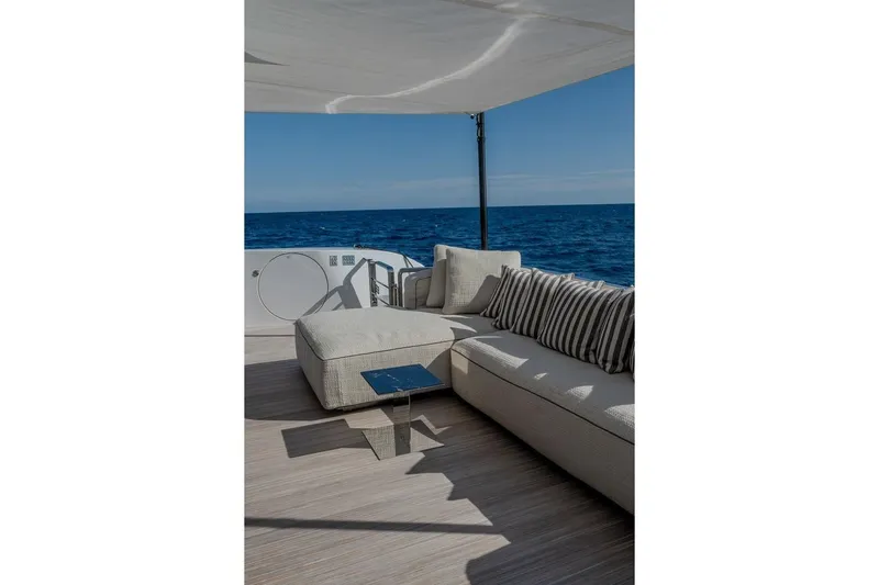  Yacht Photos Pics Luxurious deck of 2025 Ferretti Yachts INFYNITO 90 with ocean view.