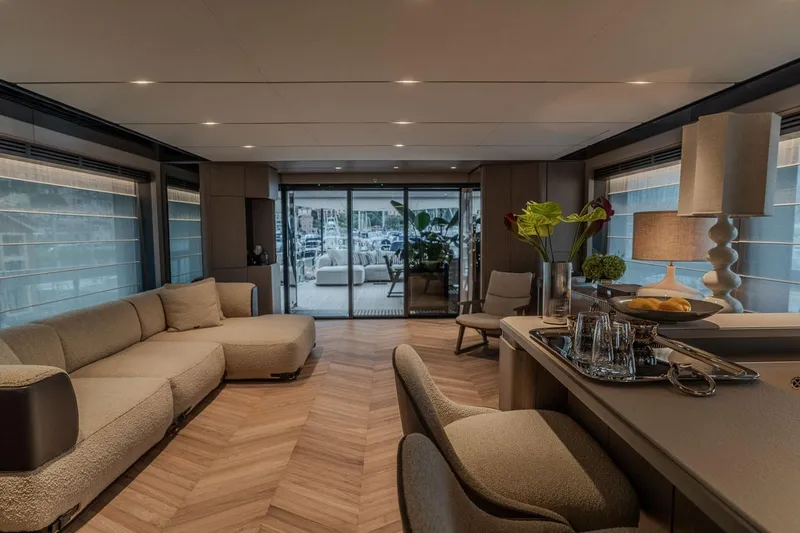  Yacht Photos Pics Luxurious interior of 2025 Ferretti Yachts INFYNITO 90 with elegant furnishings and decor.