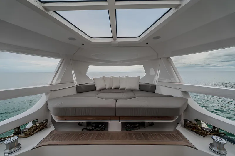  Yacht Photos Pics Luxurious interior of 2025 Ferretti Yachts INFYNITO 90 with panoramic ocean view.