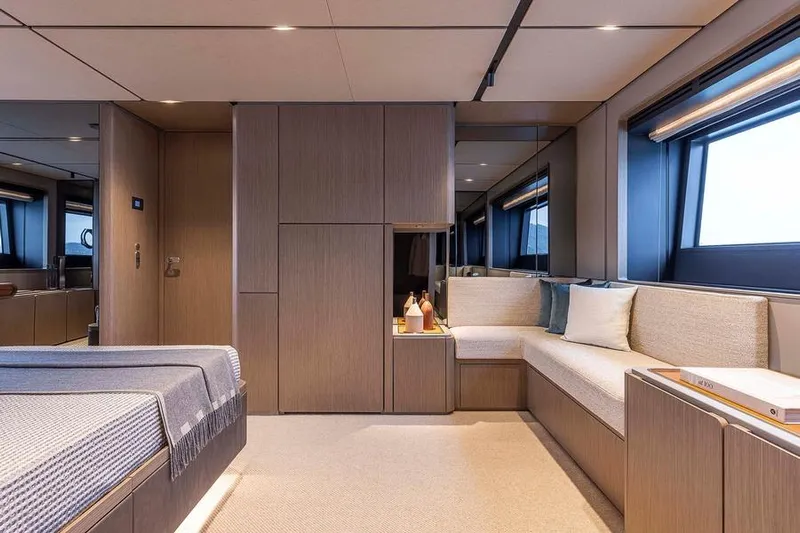  Yacht Photos Pics Luxurious interior of 2025 Ferretti Yachts INFYNITO 90 with modern seating and elegant design.
