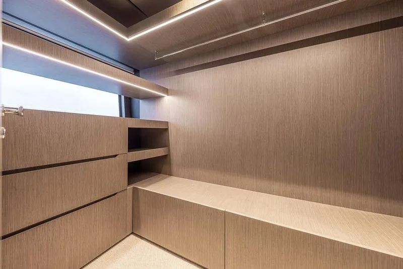  Yacht Photos Pics Luxurious interior of 2025 Ferretti Yachts INFYNITO 90 with modern wood finish and sleek design.