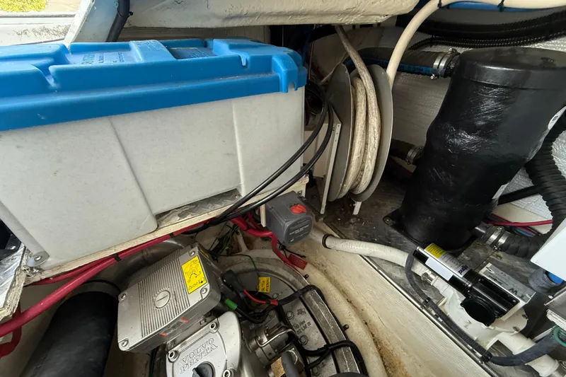 Makin' Waves II Yacht Photos Pics Engine compartment of 2011 Regal 52 Sport Coupe with visible components and wiring.