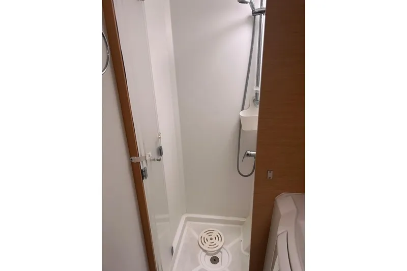 Halldis Yacht Photos Pics Shower area in 2011 Lagoon 400 yacht, featuring modern fixtures and compact design.