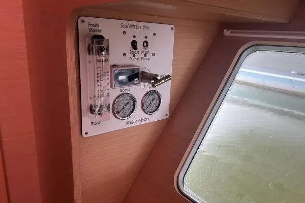 Halldis Yacht Photos Pics Control panel of a 2011 Lagoon 400 yacht with water flow and pressure gauges.