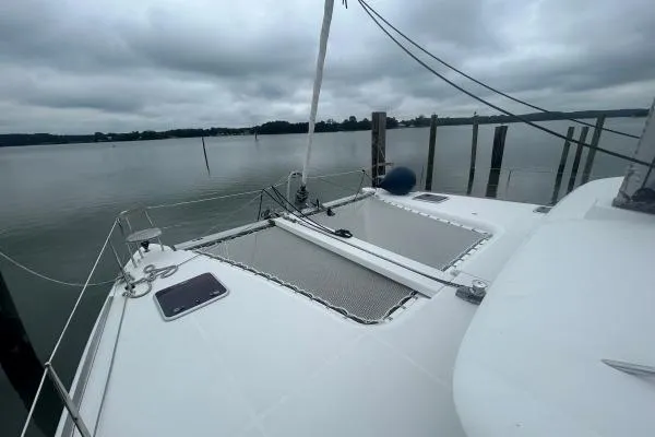 Halldis Yacht Photos Pics Catamaran deck view, Lagoon 400, 2011 model, moored on a cloudy day.