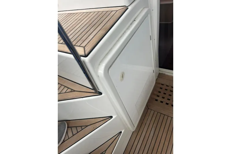 Halldis Yacht Photos Pics Staircase and door on 2011 Lagoon 400 yacht with wooden deck.
