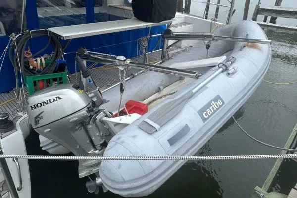 Halldis Yacht Photos Pics Inflatable Caribe boat with Honda motor on Lagoon 400 catamaran, 2011 model.