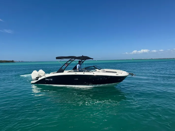  Yacht Photos Pics 2021 Sea Ray SDX 290 Outboard on open sea.