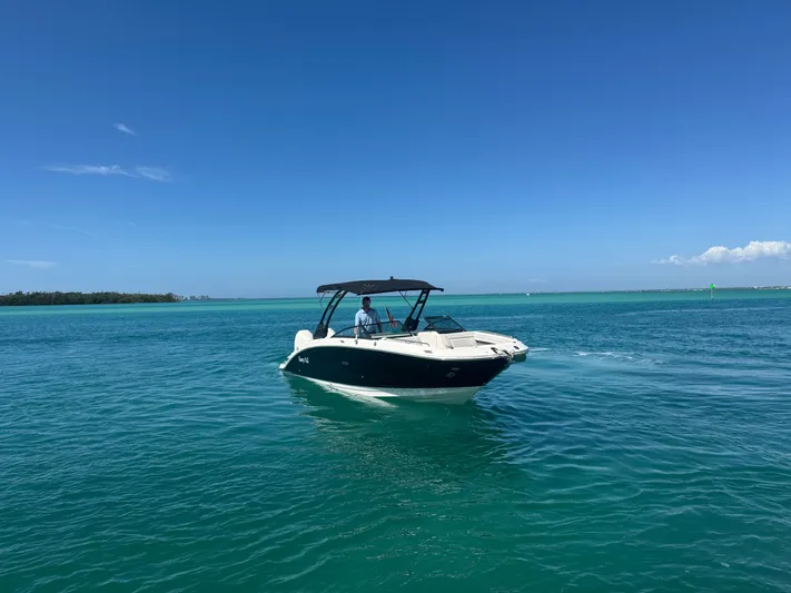  Yacht Photos Pics 2021 Sea Ray SDX 290 Outboard on open sea under clear sky.