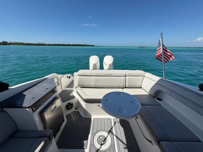  Yacht Photos Pics Interior of a 2021 Sea Ray SDX 290 Outboard on open water.