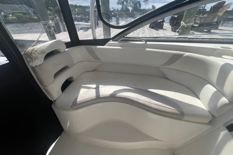  Yacht Photos Pics Interior seating of a 2004 Boston Whaler 305 Conquest boat, dockside view.