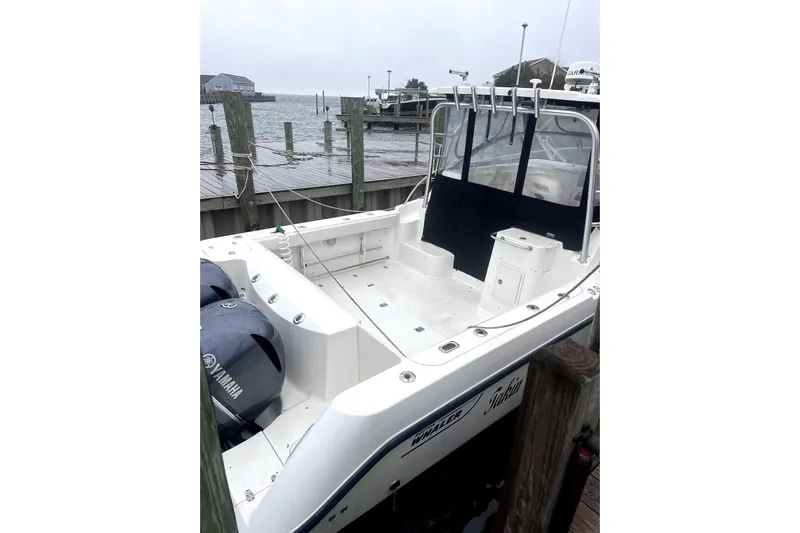  Yacht Photos Pics Boston Whaler 305 Conquest 2004 at dock with Yamaha engines.