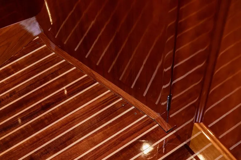 Kite Yacht Photos Pics Polished wooden interior of 2014 Hinckley Talaria 43 yacht, showcasing elegant craftsmanship.