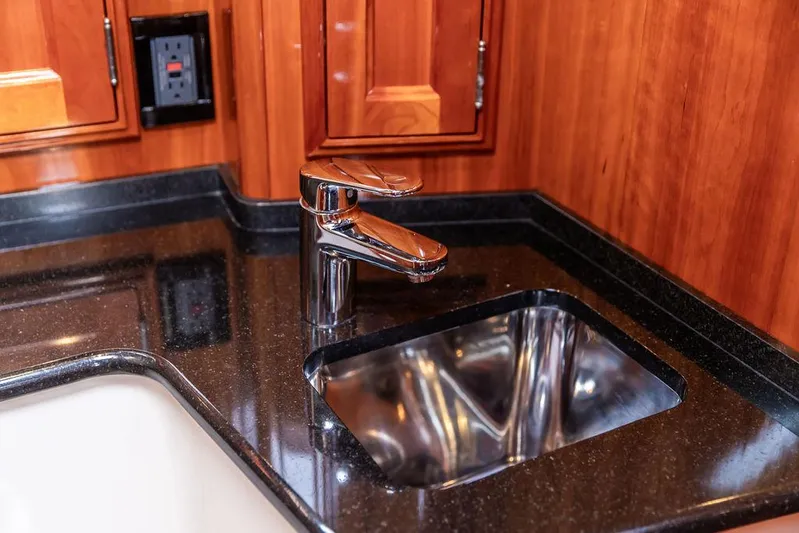 Kite Yacht Photos Pics Luxurious kitchen sink area in 2014 Hinckley Talaria 43 yacht with sleek faucet design.