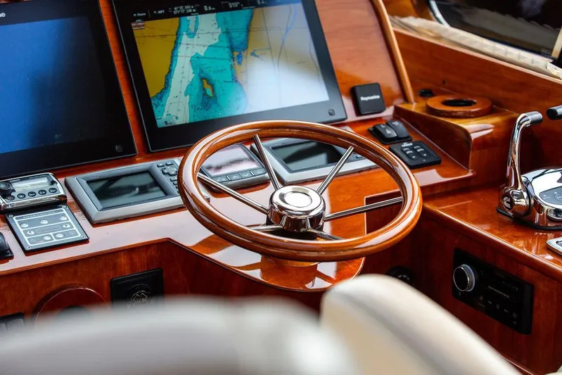 Kite Yacht Photos Pics Steering wheel and navigation screens on 2014 Hinckley Talaria 43 yacht dashboard.