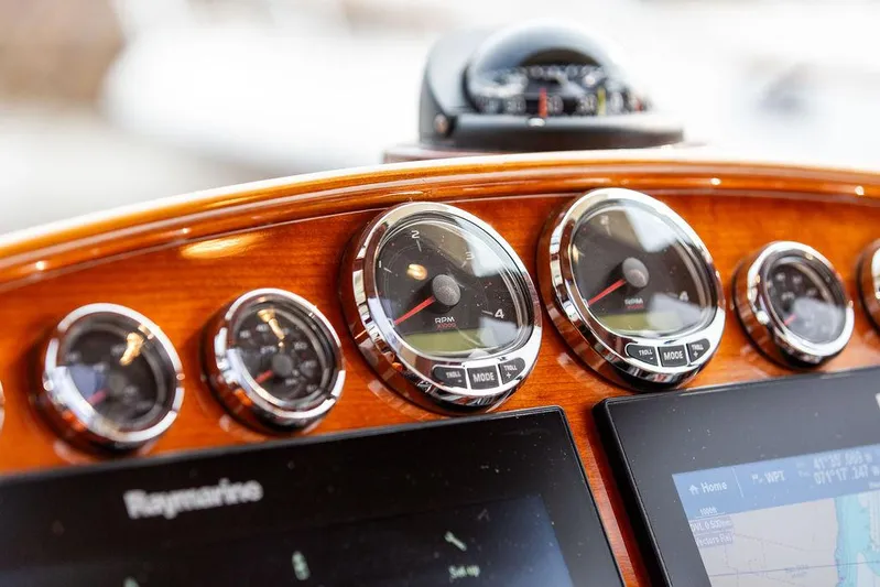 Kite Yacht Photos Pics Dashboard of 2014 Hinckley Talaria 43 with gauges and navigation screens.