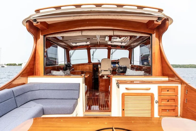 Kite Yacht Photos Pics 2014 Hinckley Talaria 43 yacht interior with elegant wood finish and comfortable seating.