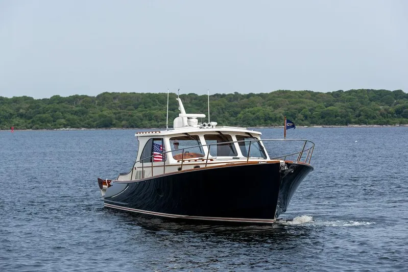 Kite Yacht Photos Pics 2014 Hinckley Talaria 43 yacht cruising on calm waters.