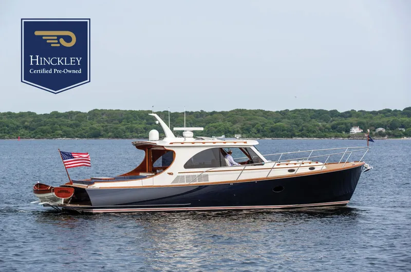 Kite Yacht Photos Pics 2014 Hinckley Talaria 43 yacht on water, American flag, certified pre-owned.