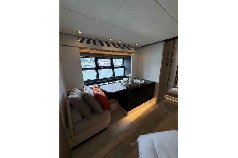  Yacht Photos Pics Luxurious interior of 2019 Azimut S6 yacht with elegant seating and window view.