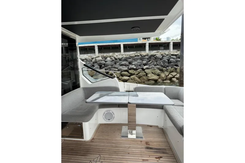  Yacht Photos Pics 2019 Azimut S6 yacht interior with sleek seating and modern table design.