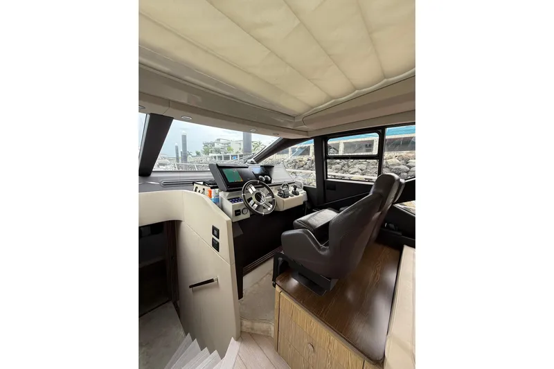  Yacht Photos Pics Interior of 2019 Azimut S6 yacht cockpit with modern steering and navigation controls.