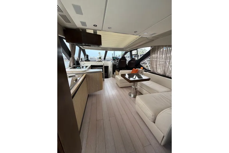 Yacht Photos Pics Luxurious interior of 2019 Azimut S6 yacht with modern furnishings and sleek design.