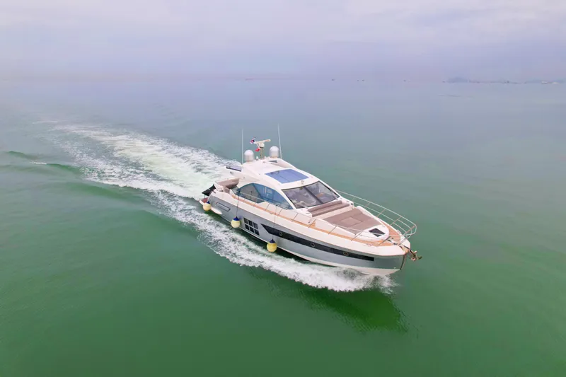  Yacht Photos Pics 2019 Azimut S6 yacht cruising on calm green waters.
