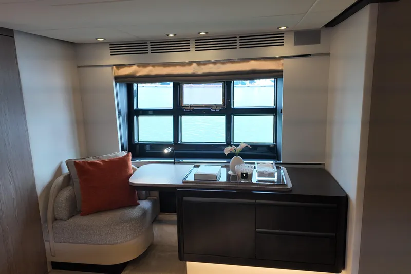  Yacht Photos Pics Luxurious interior of 2019 Azimut S6 yacht with elegant seating and window view.