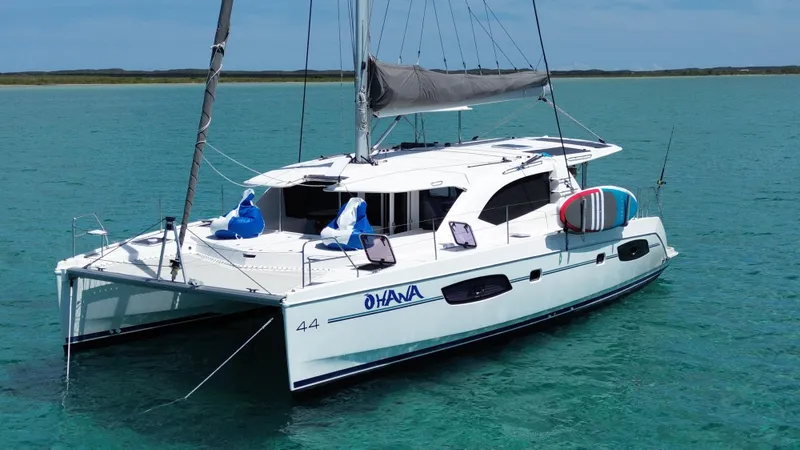  Yacht Photos Pics 2016 Leopard 44 catamaran sailing on clear turquoise waters.