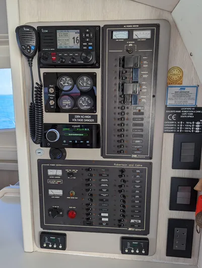  Yacht Photos Pics Control panel of a 2016 Leopard 44 yacht with navigation and electrical systems.