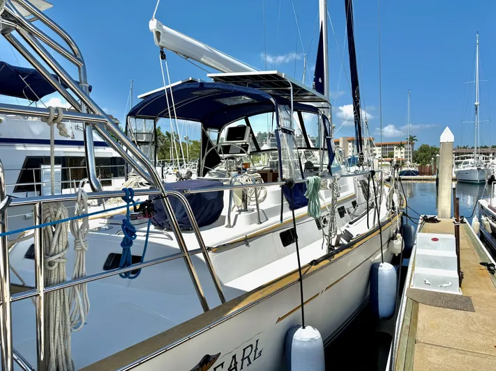 Bluepearl Yacht Photos Pics Sailboat docked at marina, Passport Vista 515CC, 2006 model, sunny day.