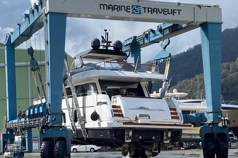  Yacht Photos Pics 2019 Sanlorenzo 86 yacht lifted by Marine Travelift at a shipyard.