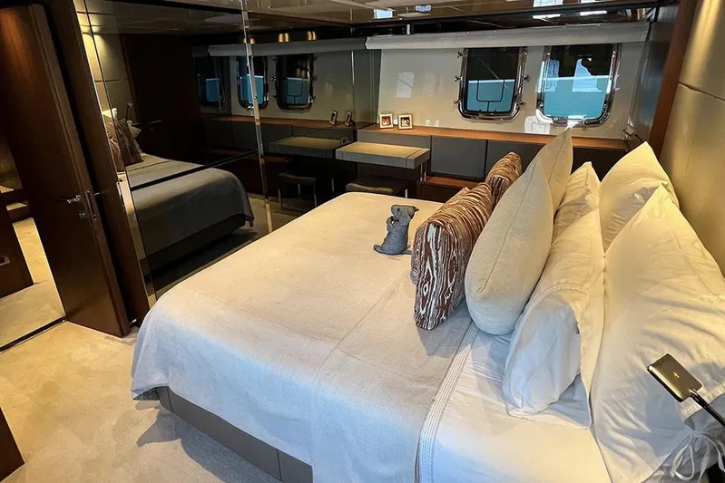  Yacht Photos Pics Luxurious 2019 Sanlorenzo 86 yacht bedroom with elegant decor and plush bedding.