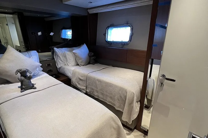  Yacht Photos Pics Luxurious 2019 Sanlorenzo 86 yacht cabin with twin beds and plush decor.