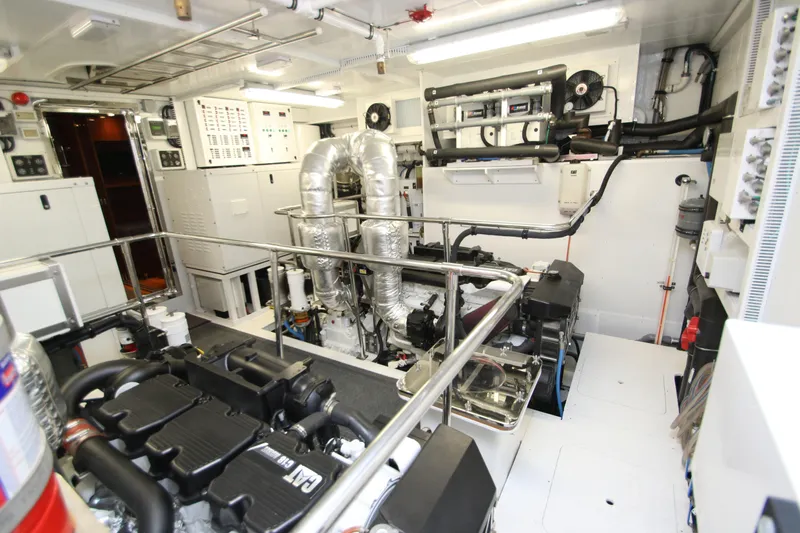 Quit Sun Yacht Photos Pics Engine room of 2015 Hargrave 76 yacht, featuring advanced machinery and control systems.