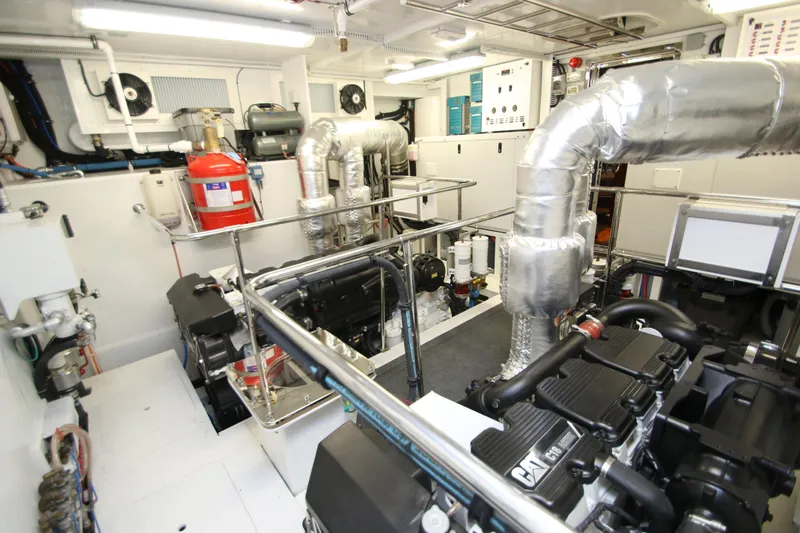 Quit Sun Yacht Photos Pics Engine room of 2015 Hargrave 76 yacht, featuring advanced machinery and equipment.