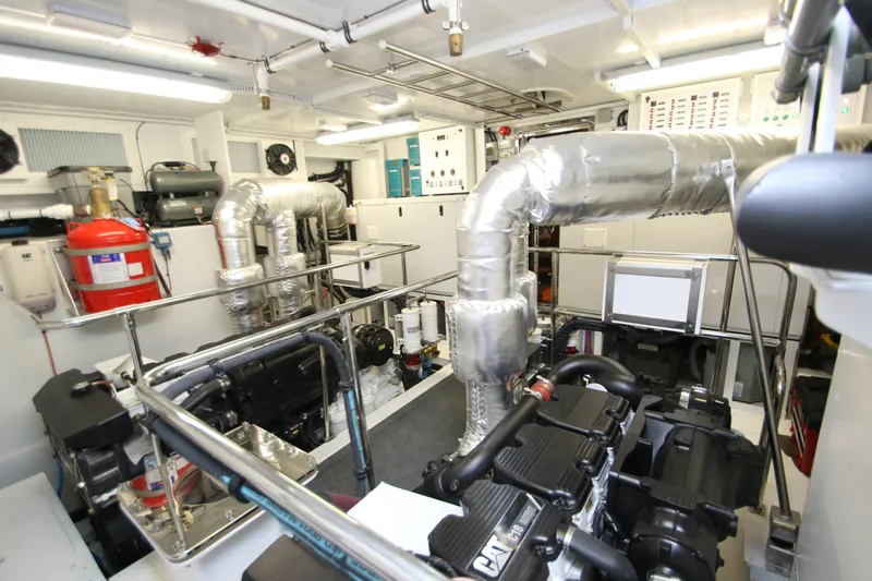 Quit Sun Yacht Photos Pics Engine room of 2015 Hargrave 76 yacht, featuring advanced machinery and equipment.