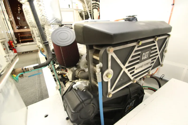 Quit Sun Yacht Photos Pics Engine room of 2015 Hargrave 76 yacht featuring CAT marine power engine.