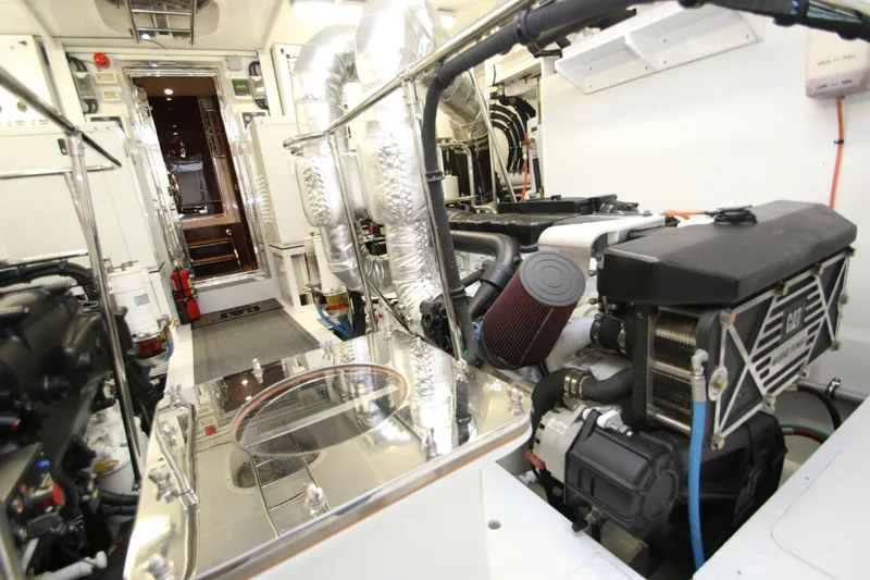 Quit Sun Yacht Photos Pics Engine room of 2015 Hargrave 76 yacht, featuring advanced machinery and equipment.