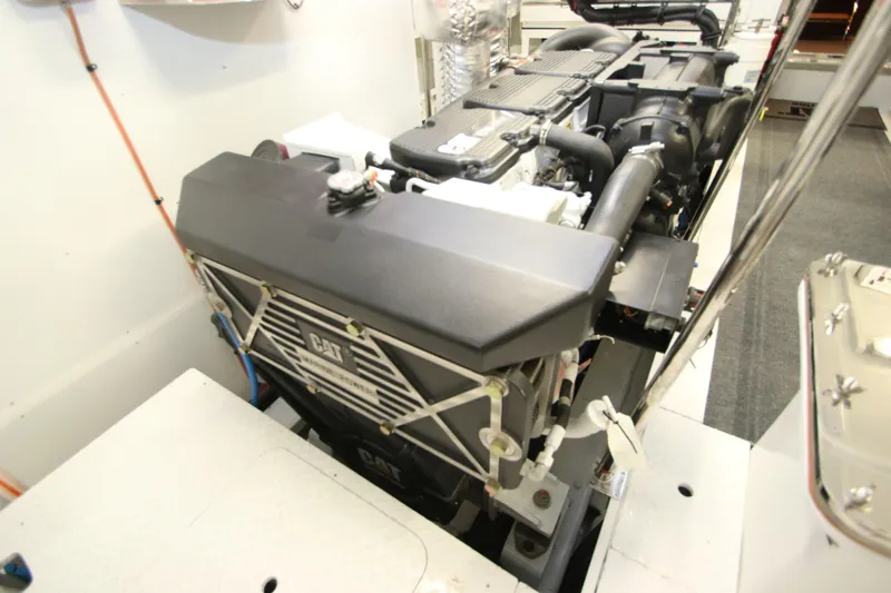 Quit Sun Yacht Photos Pics Engine room of 2015 Hargrave 76 yacht featuring a CAT engine.