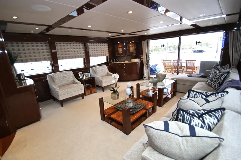 Quit Sun Yacht Photos Pics Luxurious interior of 2015 Hargrave 76 yacht with elegant seating and modern decor.
