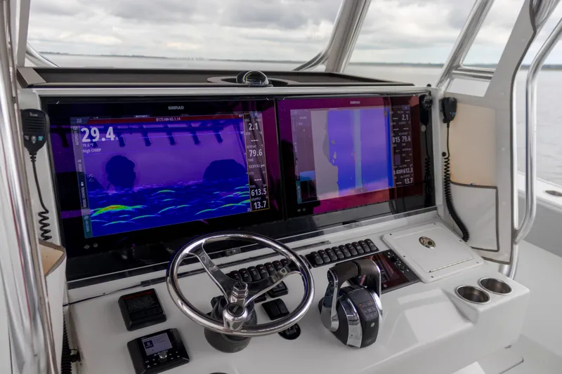  Yacht Photos Pics Freeman 42LR 2020 boat dashboard with advanced navigation screens and controls.